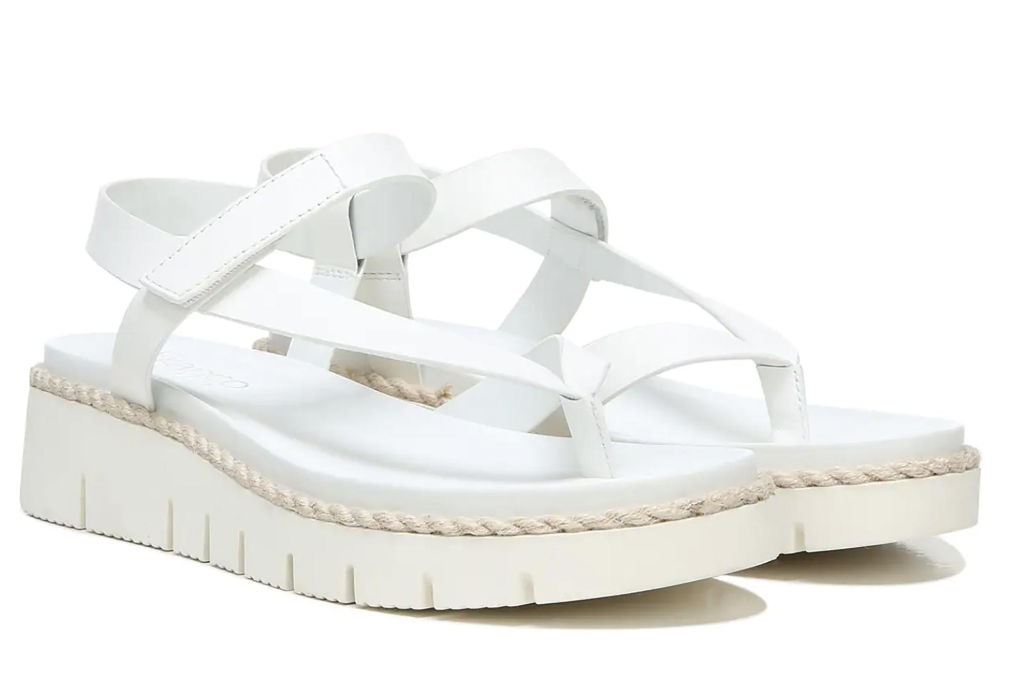 A pair of white platform sandals