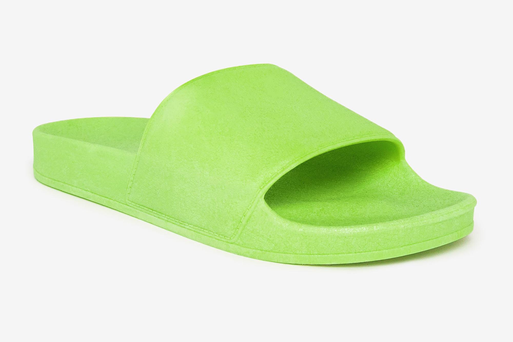 A neon green slide sandal