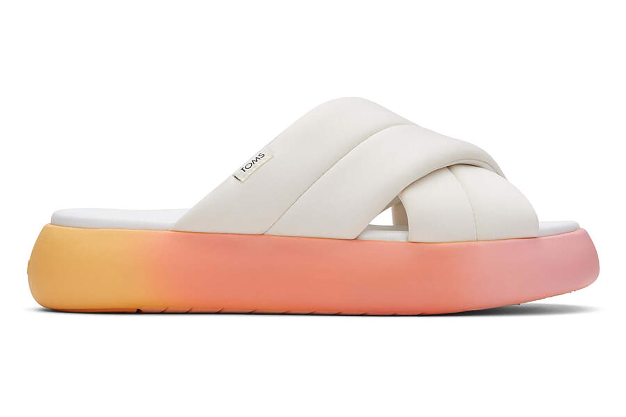 A white slide with a pink ombre sole