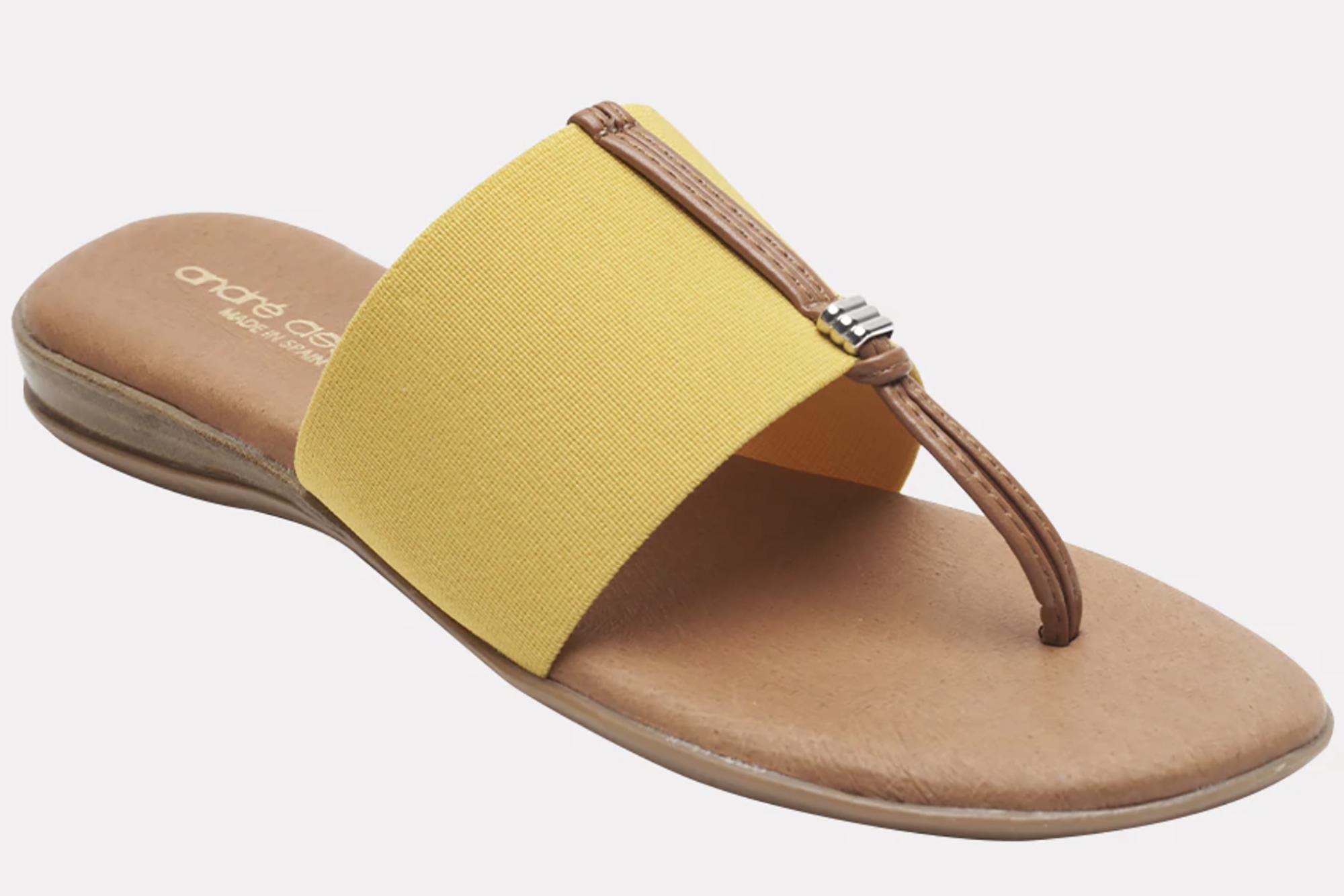 A yellow and beige flat sandal