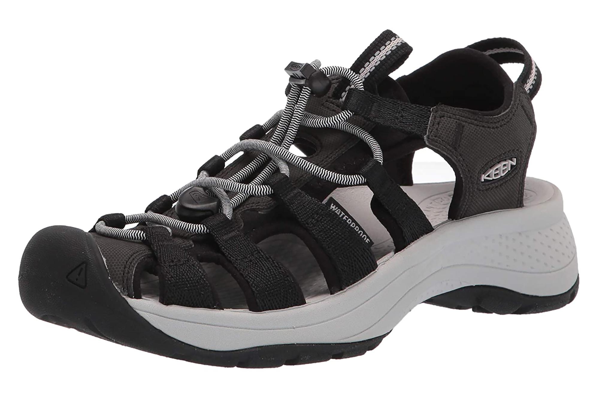 A black and gray KEEN hiking shoe