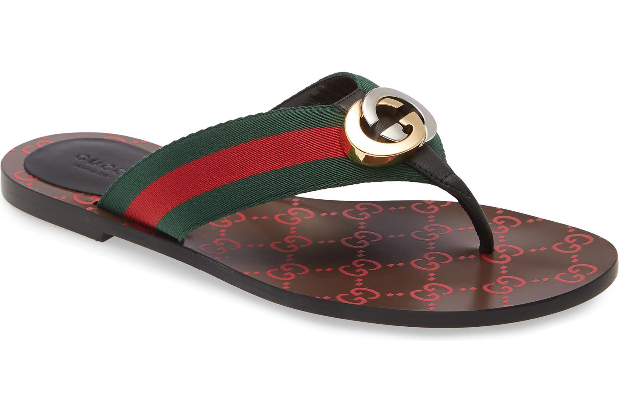 A brown Gucci flip flop