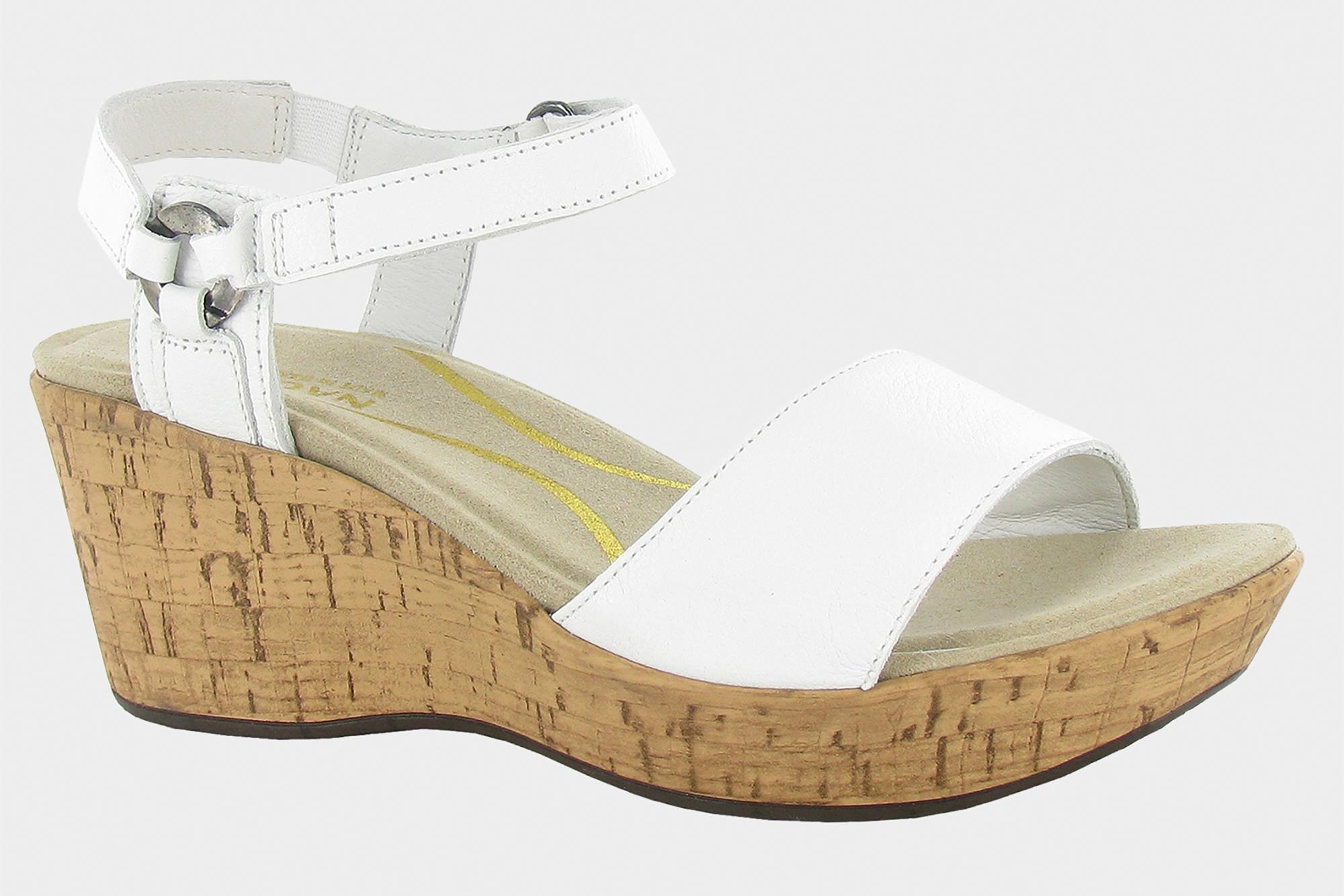 A white strappy wedge sandal