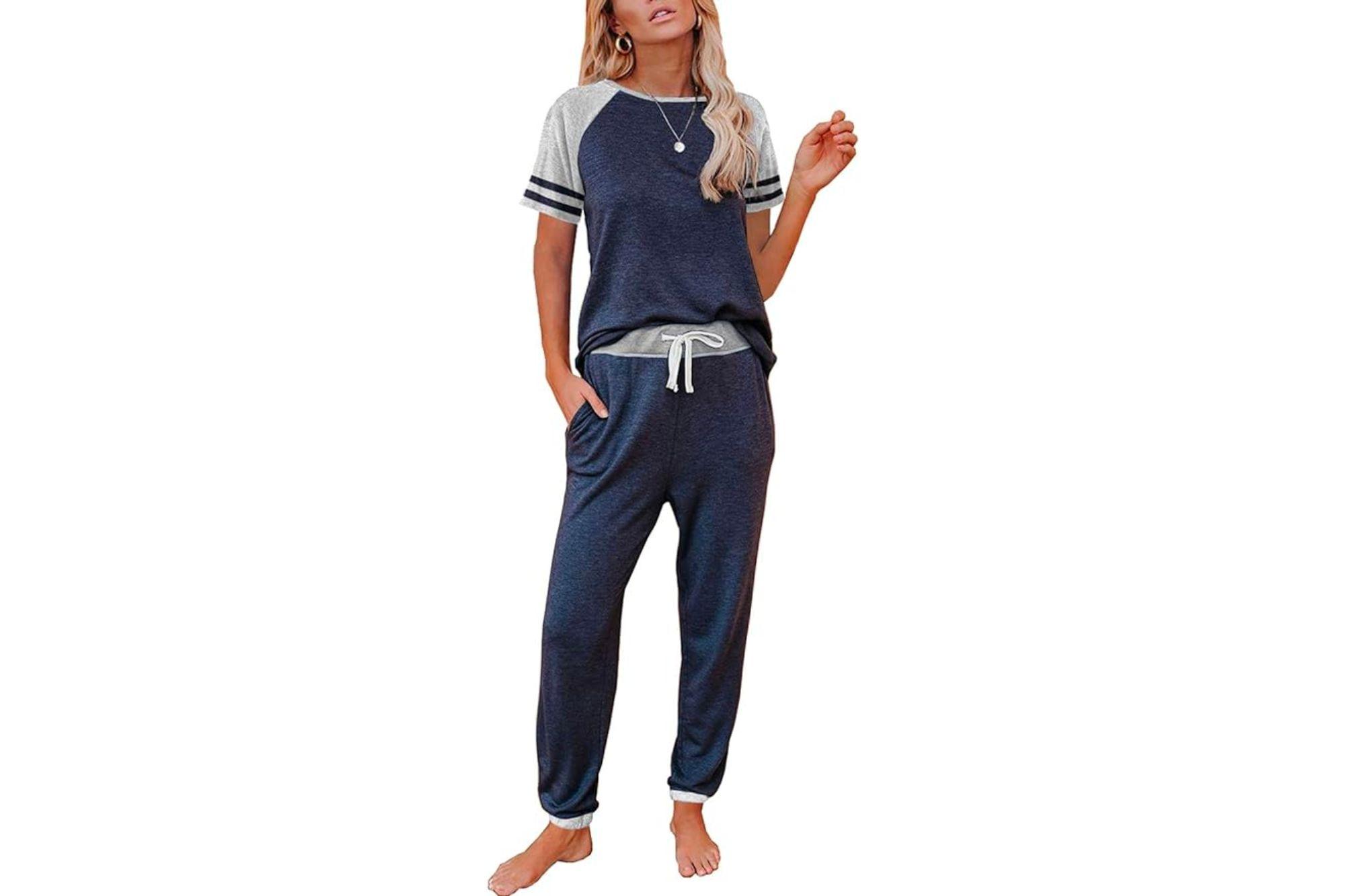 Woman in a blue and grey loungewear set.