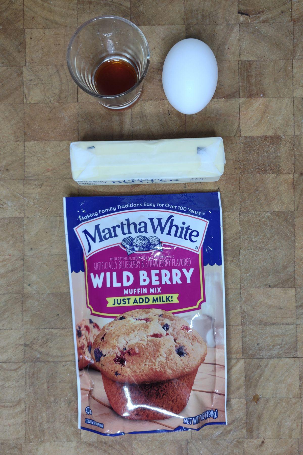 Muffin mix cookie ingredients on a wooden table.