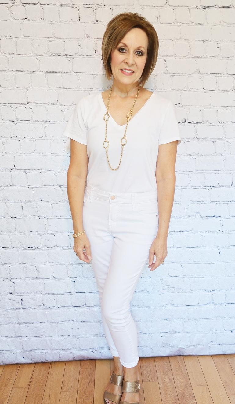 50 With Flair, Over 50 Style, White Monochromatic Outfit, White Jeans, White T-shirt, White Cardigan, Gold Accessories, Gold Shoes