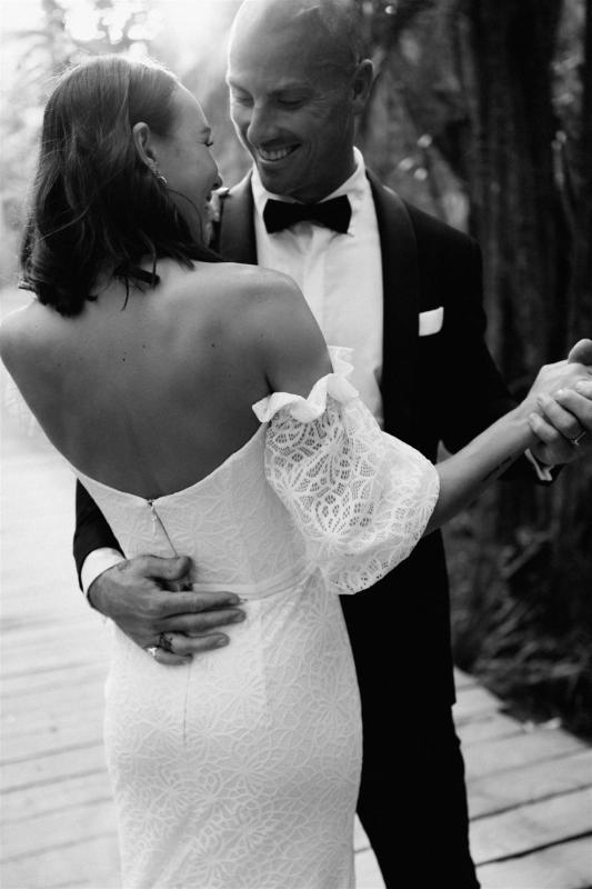 Brie-Karen Willis Holmes - Taylor & Angus - Bride and groom seen sharing their love after their ceremony and exchanging their vows, amongst the hills for their wedding photos. Bride is wearing a classic Head band piece to finish her bridal look.