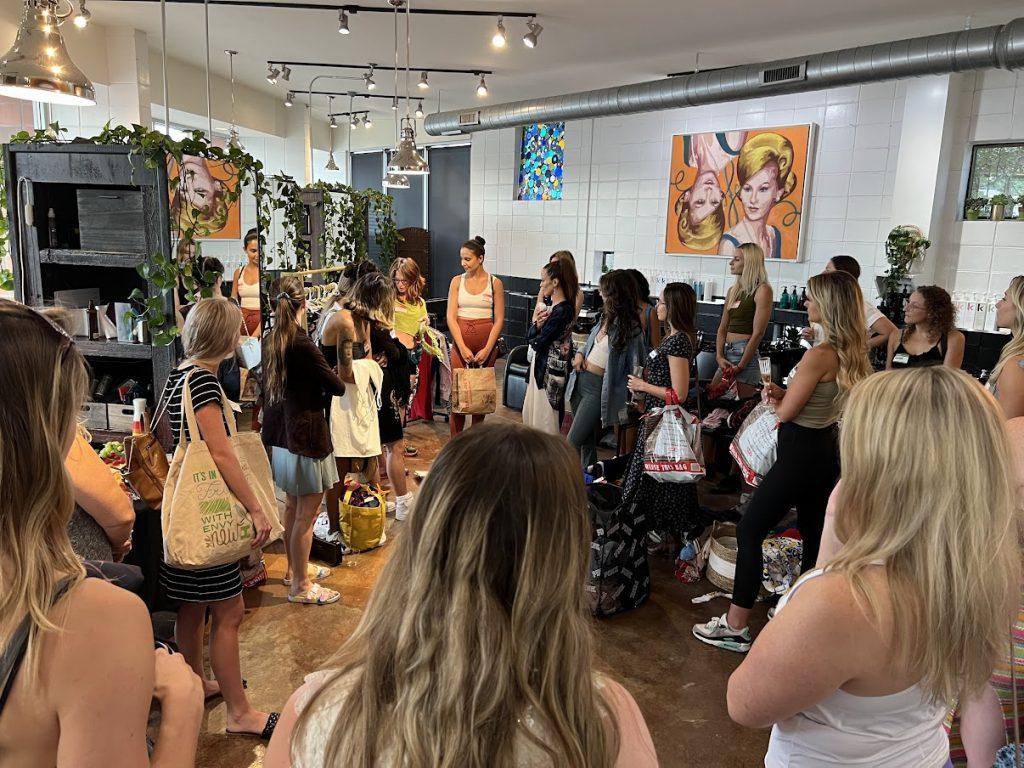 Girls at the clothing swap circling up for icebreakers