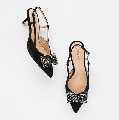 black kitten heel pumps with a grosgrain bow