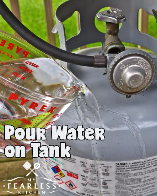 pour warm water over a propane tank to see how full it is