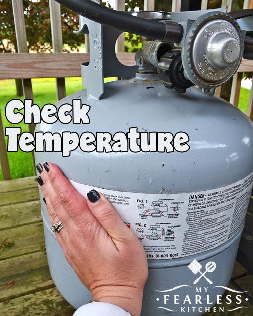 check the temperature of the outside of a propane tank to see how full it is