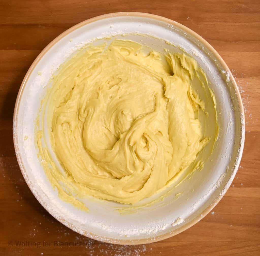 Large mixing bowl of anise pizzelle batter.