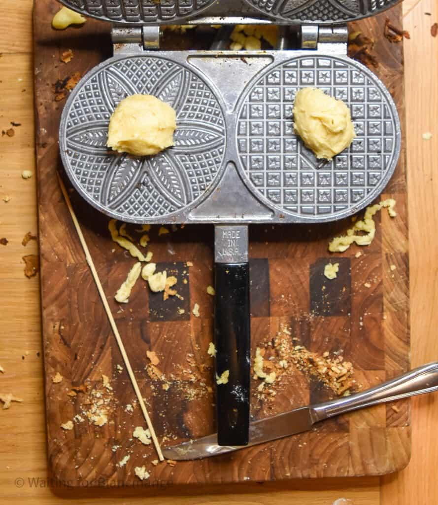 Dolloped batter onto the middle of the pizzelle moulds.