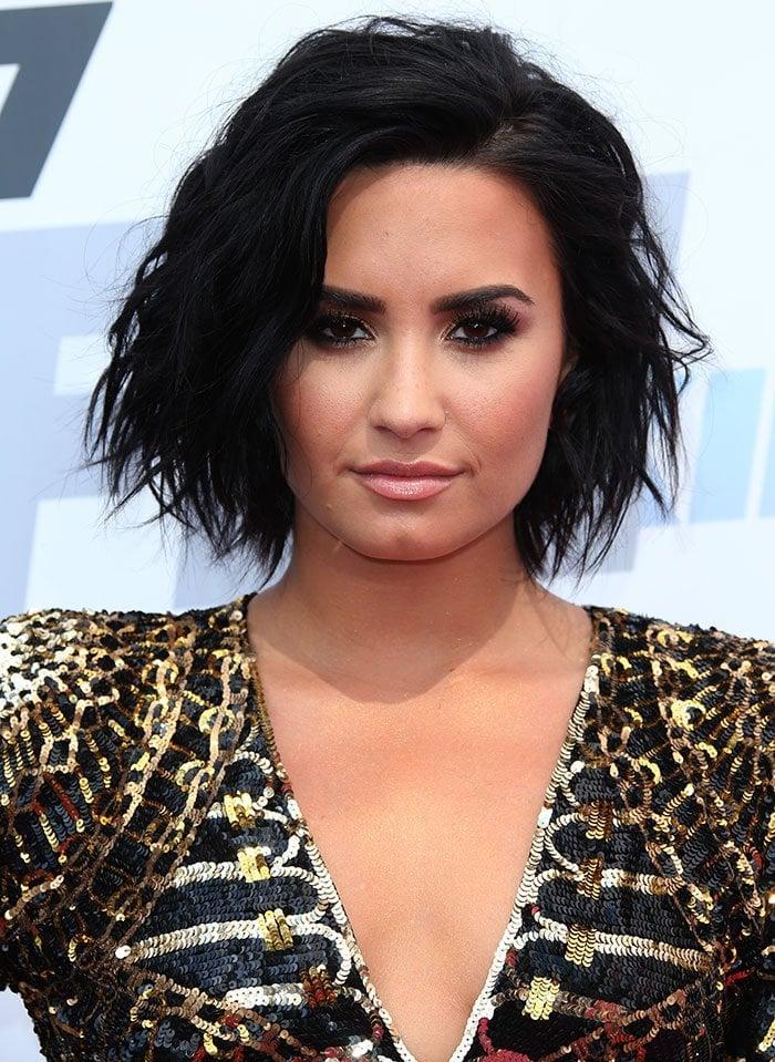 Demi Lovato tousles her dark hair for the 2016 102.7 KIIS FM