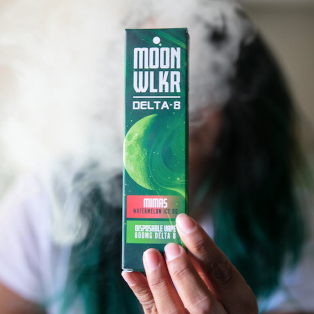 Plain Jane Cherry Creme Brulee 6 Pack Joints turquoise yellow tins group shot on white background with one joint on the outside Flying With Weed: How To Get Cannabis Through Airport Security