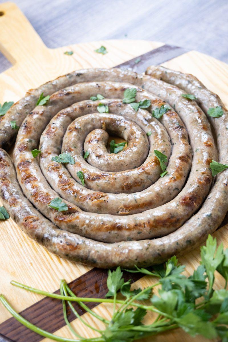 grilled Italian Ring Sausage topped with parsley