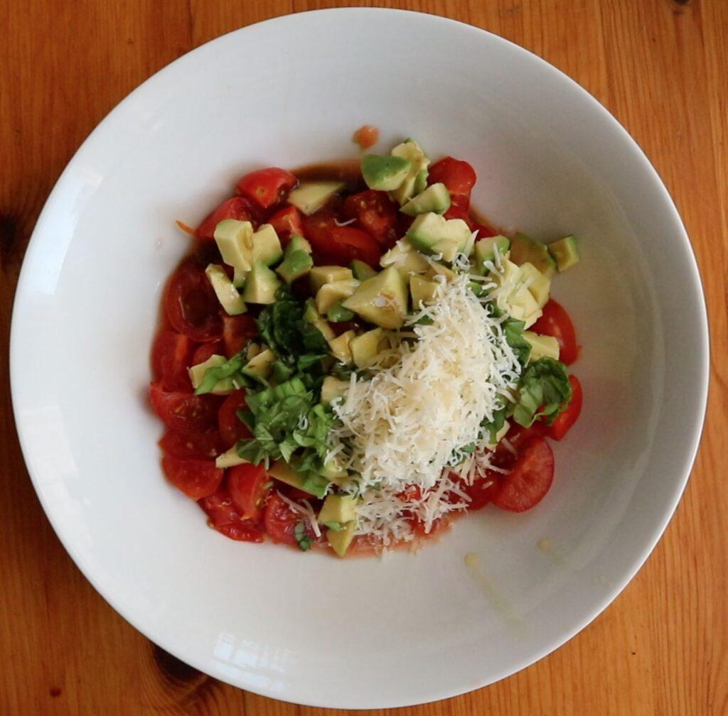 Topping vegetable slices with bruschetta topping.