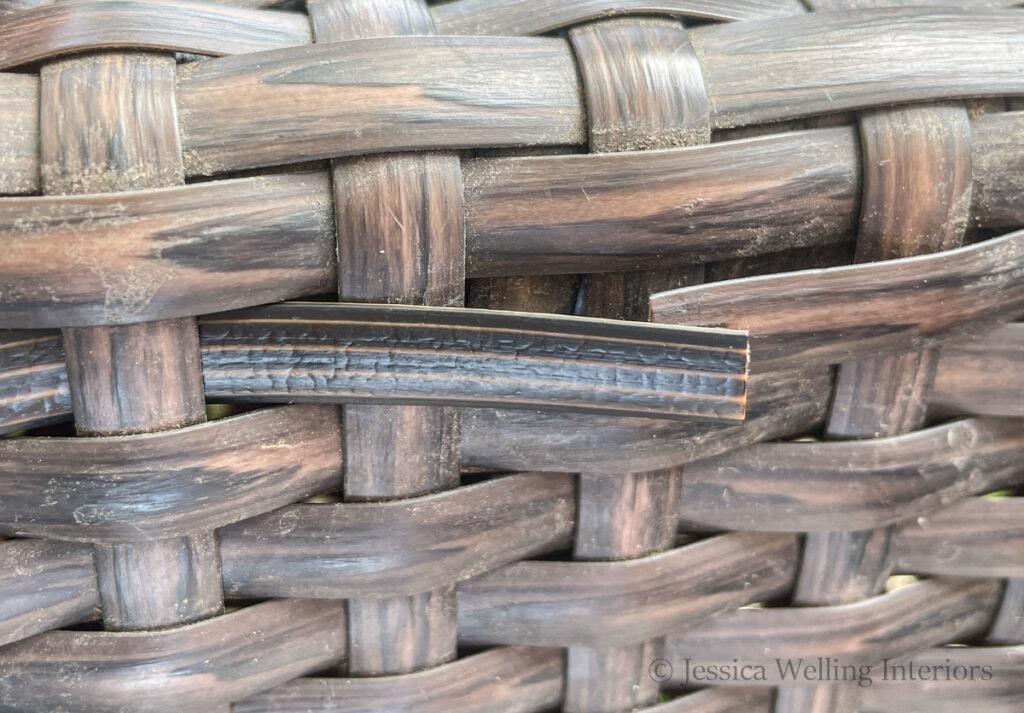 close-up of loose ends of two resin wicker reeds