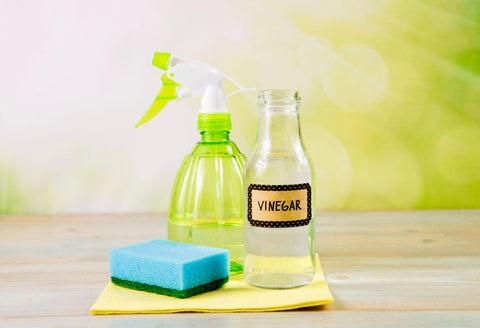 Using natural destilled white vinegar in spray bottle to remove stains