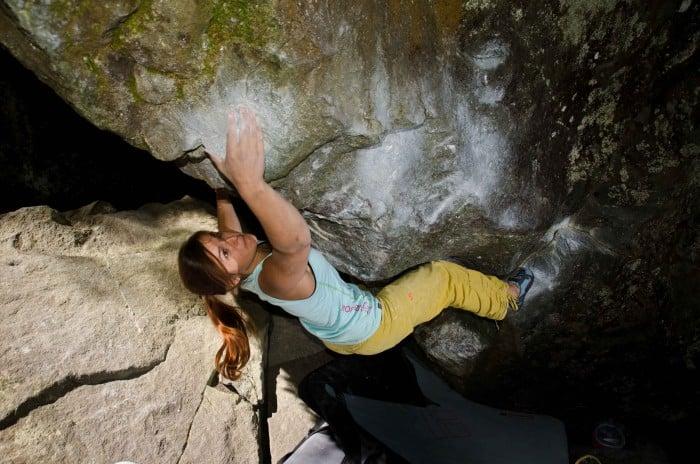 A girl bouldering