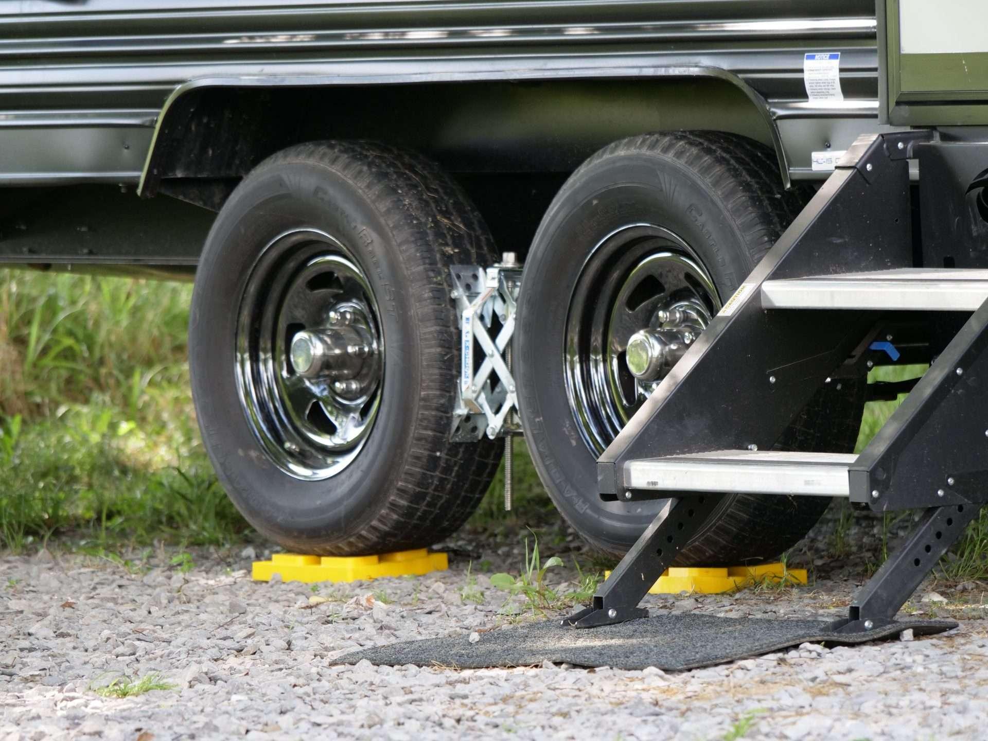 Underneath RV where an RV leveler in place.