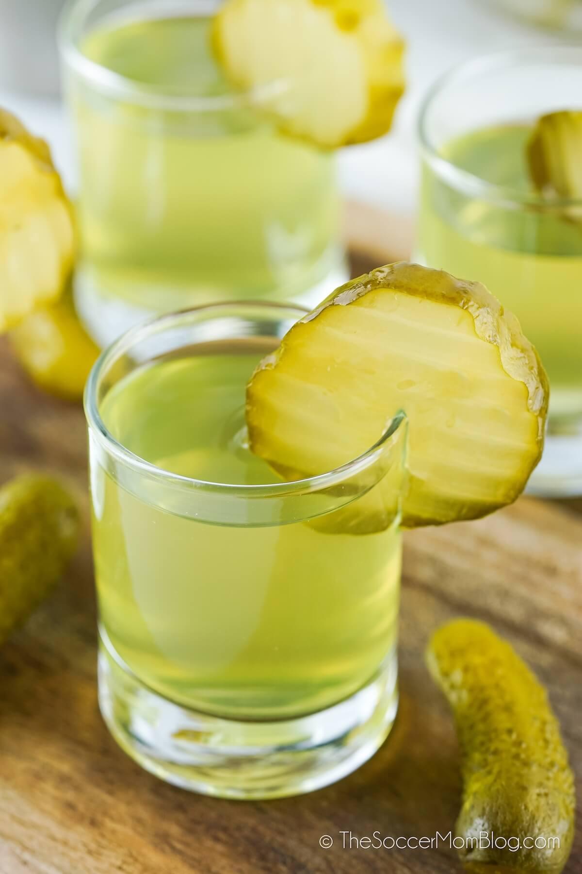 Dill Pickle Shots on wooden board