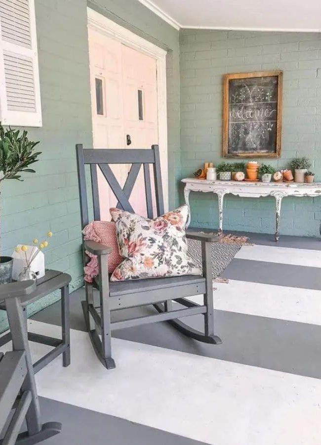 Striped painted concrete porch floor