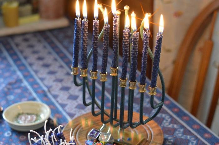 Making beeswax candles for Hanukkah is an easy craft that you can share with children as young as 5. Beeswax candles burn cleanly and dripfree when made with a properly sized wick. Unlike paraffin candles that give off toxic fumes when burning, beeswax candles give off negative ions that clean the air and improve indoor air quality. Make DIY beeswax candles for Hanukkah in about an hour.