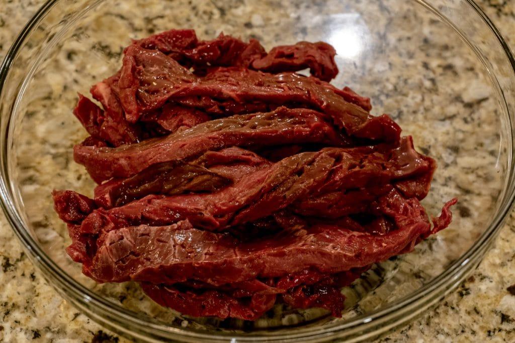 tenderized elk heart strips in bowl