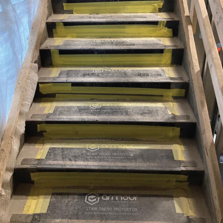 6 Ways To Properly Protect Stairs During A Construction Project - Armour Stair Tread Protector On Jobsite