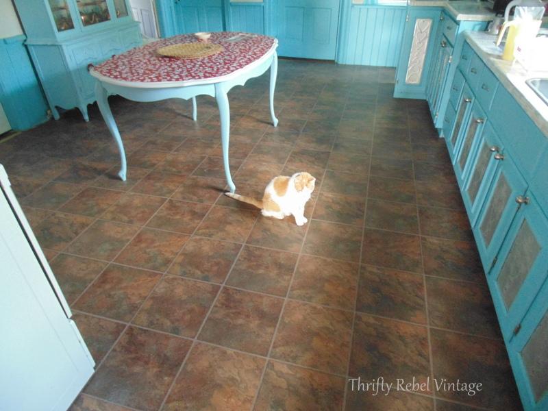 kitchen vinyl plank flooring before removal