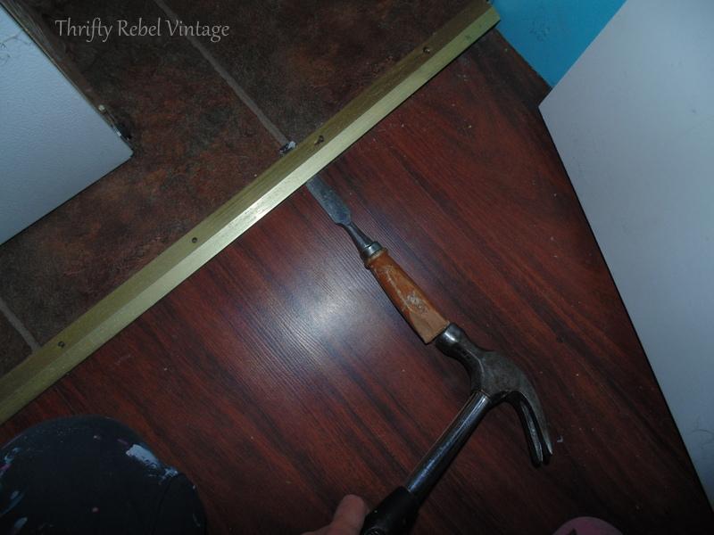 removing metal door threshholds for vinyl plank floating floor