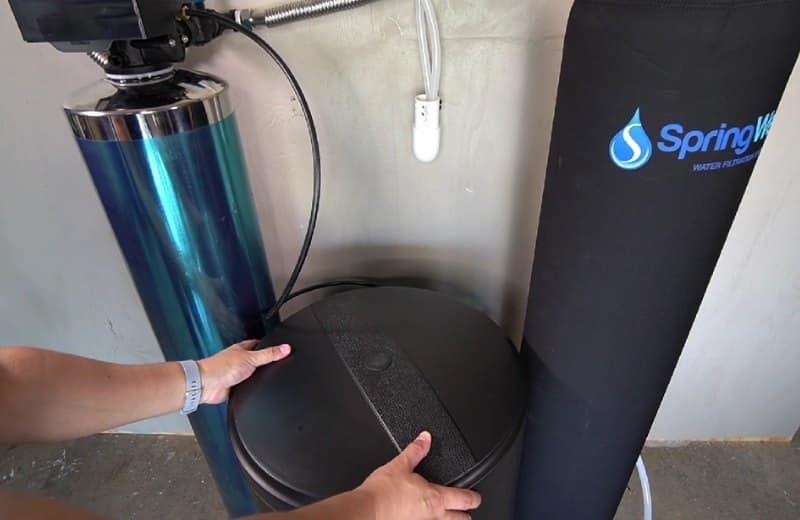 Removing a water softener brine tank to drain it