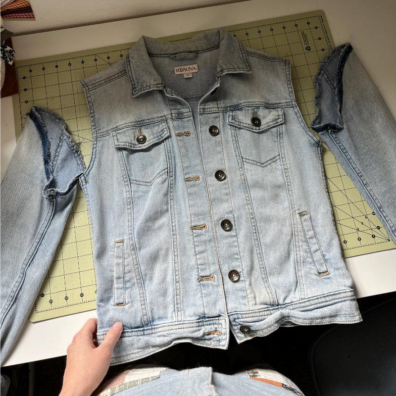 showing the sleeves cut off the denim vest