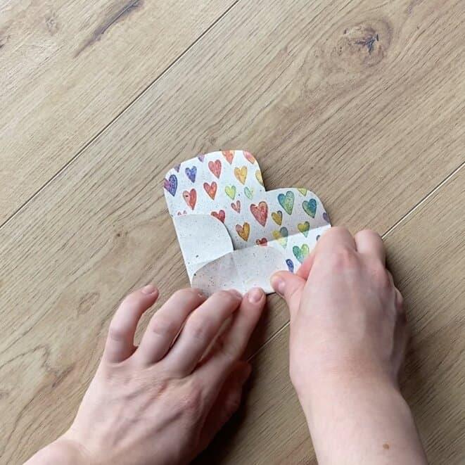 Wrapping loose jewelry pieces in a DIY small package.