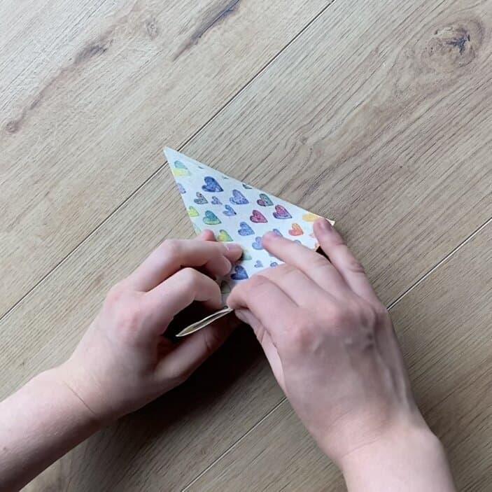 Wrapping loose jewelry pieces in a DIY gift pyramid.