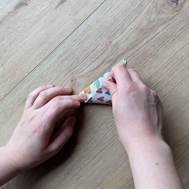 Wrapping loose jewelry pieces in a DIY gift pyramid.