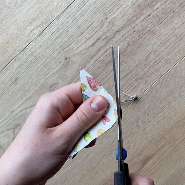 Wrapping loose jewelry pieces in a DIY gift pyramid.