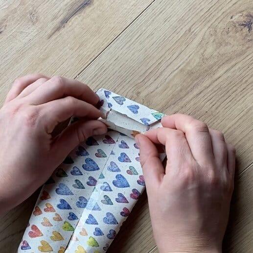 Wrapping loose jewelry pieces in a DIY gift bag.