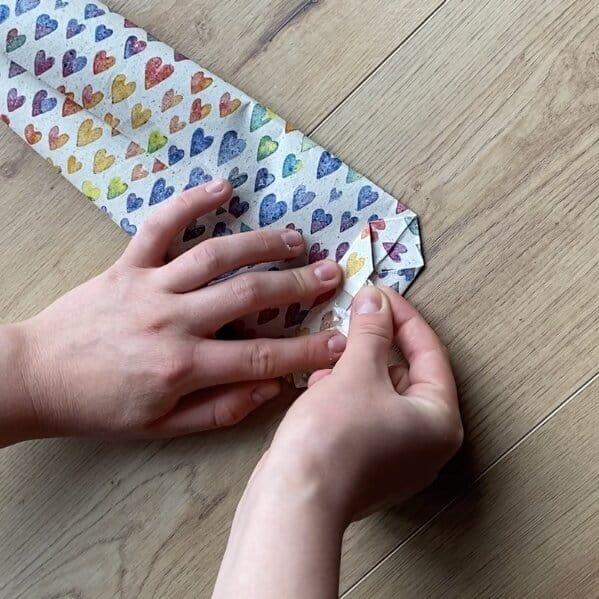 Wrapping loose jewelry pieces in a DIY gift bag.