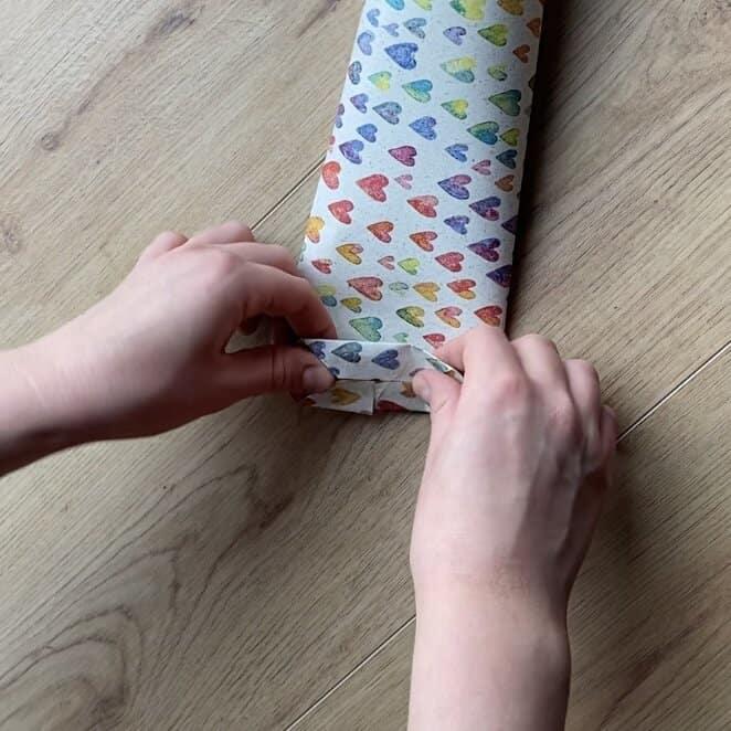 Wrapping loose jewelry pieces in a DIY gift bag.